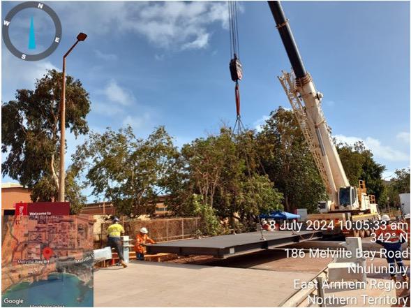 Prefabricated Bridge Modules being installed over concrete footings